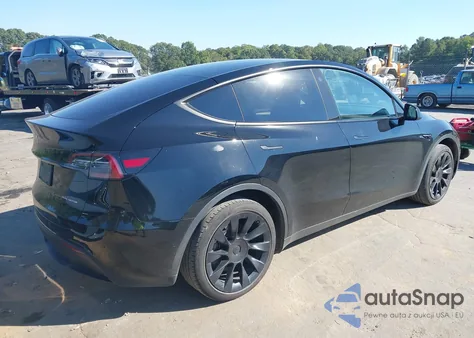 2022 Tesla Model Y Long Range Dual Motor All-Wheel Drive z USA, uszkodzony, nr VIN 7SAYGAEE8NF574463